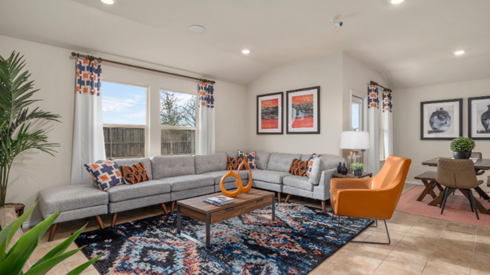 Yowell Ranch Model Home with windows for lighting and view of open concept dining room.