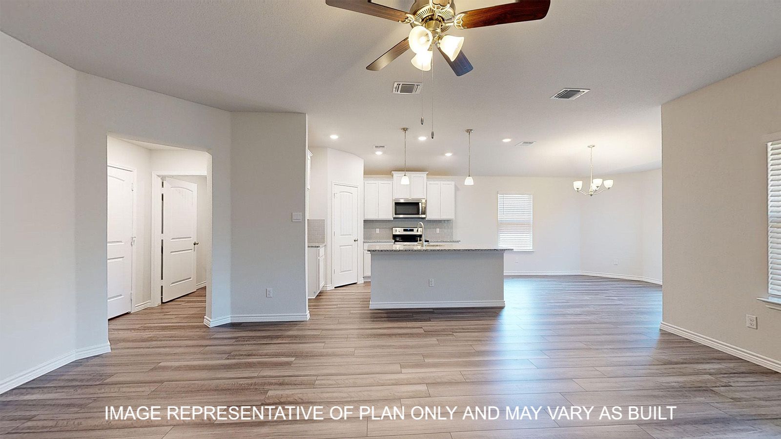 Alpine living room with view into kitchen and dining room.
