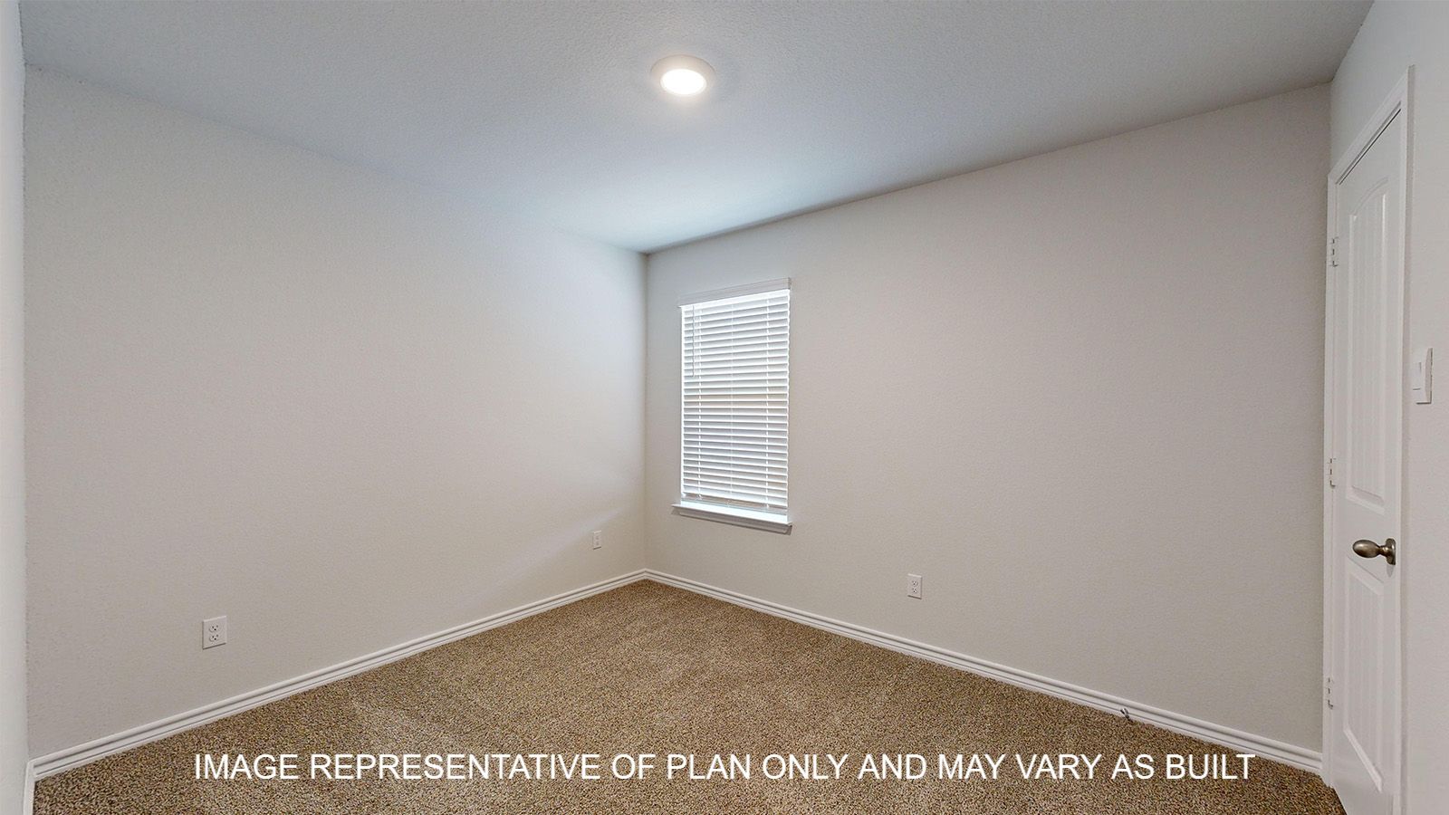 Alpine secondary bedroom with carpet flooring and window.