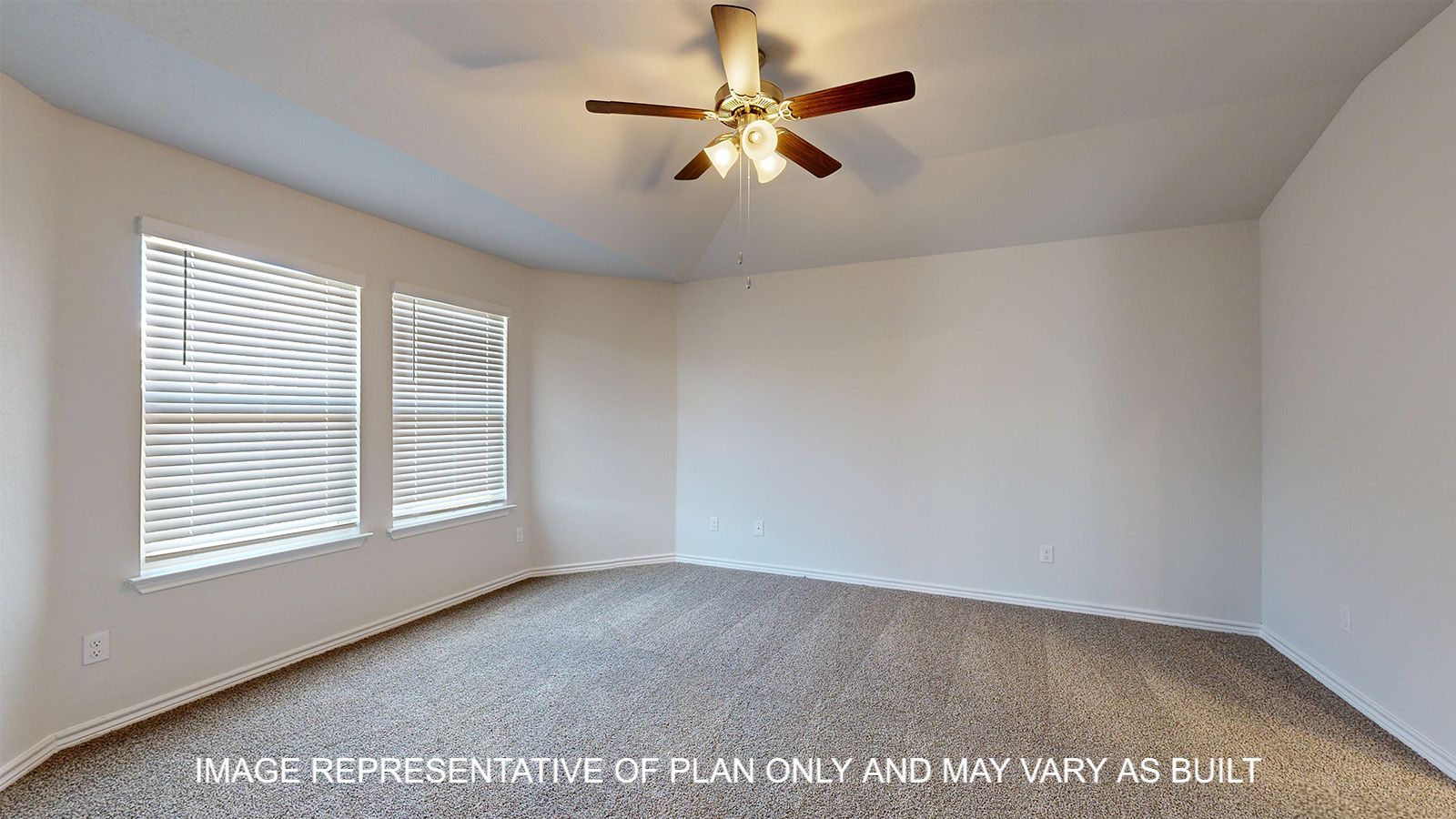 Alpine primary bedroom with carpet flooring and bay windows.