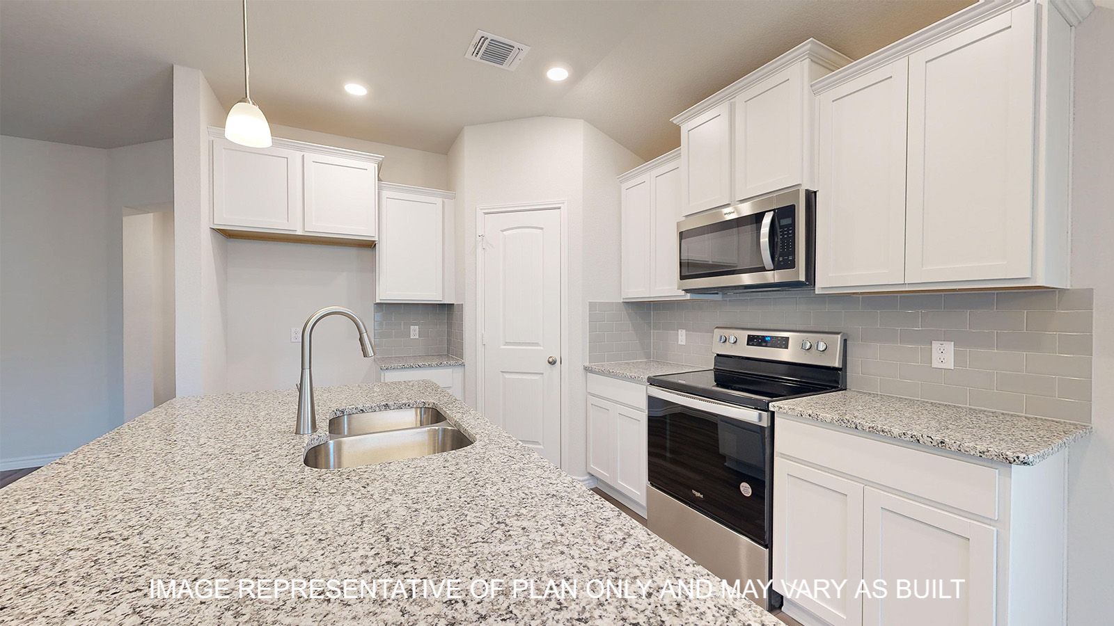 Alpine kitchen with corner pantry and stainless appliances.