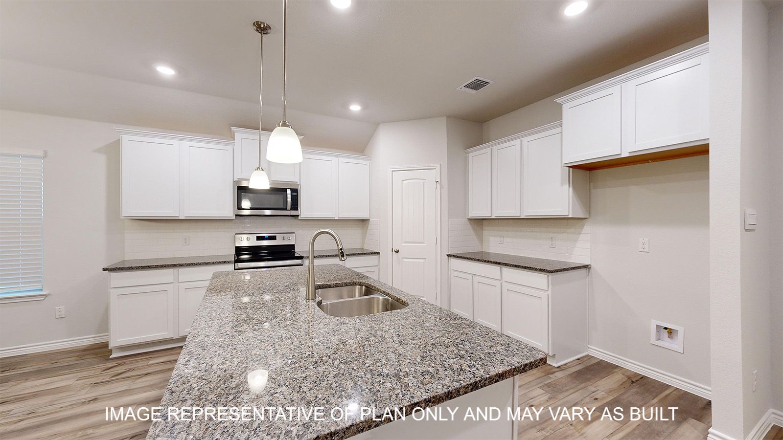 Everett kitchen with large kitchen island and stainless appliances.