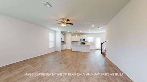 Aspen open concept living area with view to kitchen.