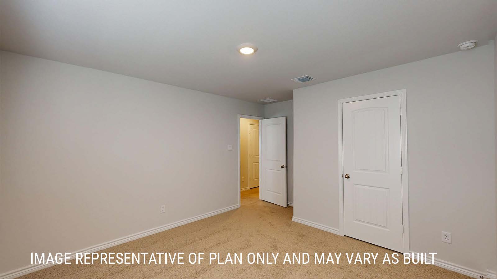 Sonoma secondary bedroom with carpeted flooring and view of closet door.
