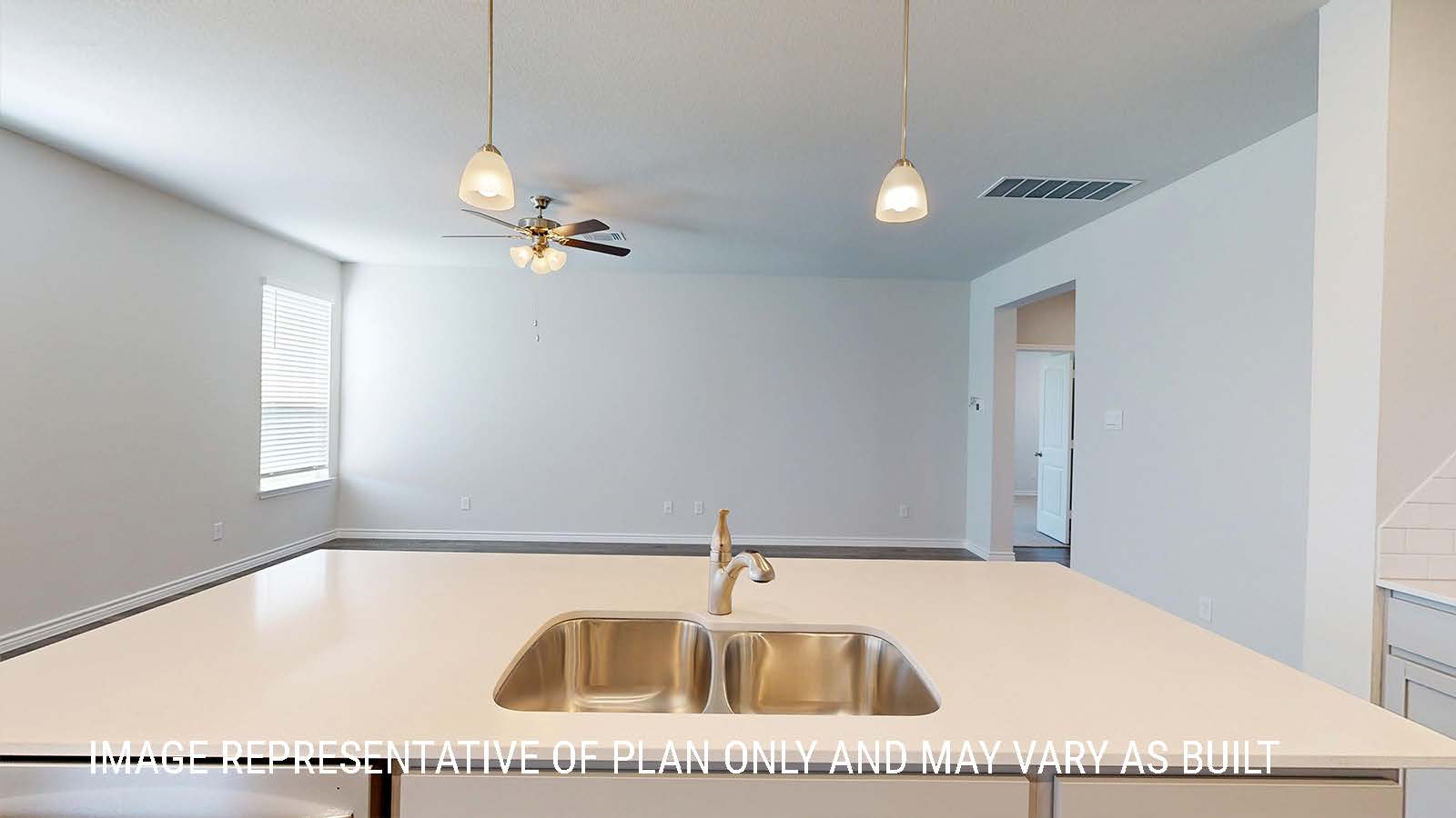 Sonoma kitchen with center kitchen island with granite countertops and view of dining room.