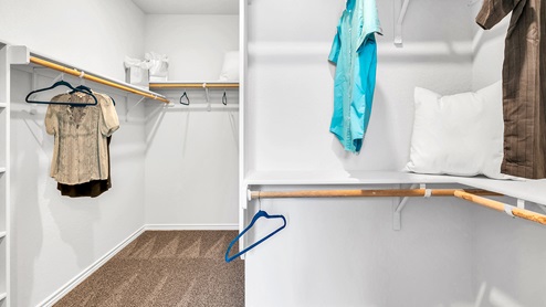 Three Creeks Colt Creek model home primary closet with spacious room.