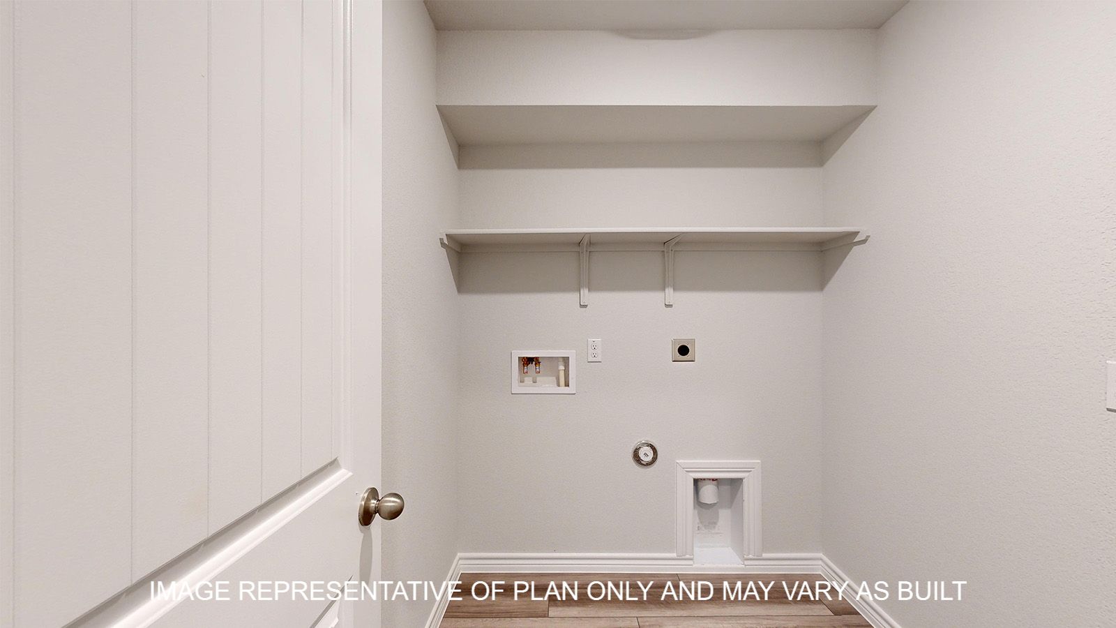 Alpine utility room with vinyl flooring and storage shelf.