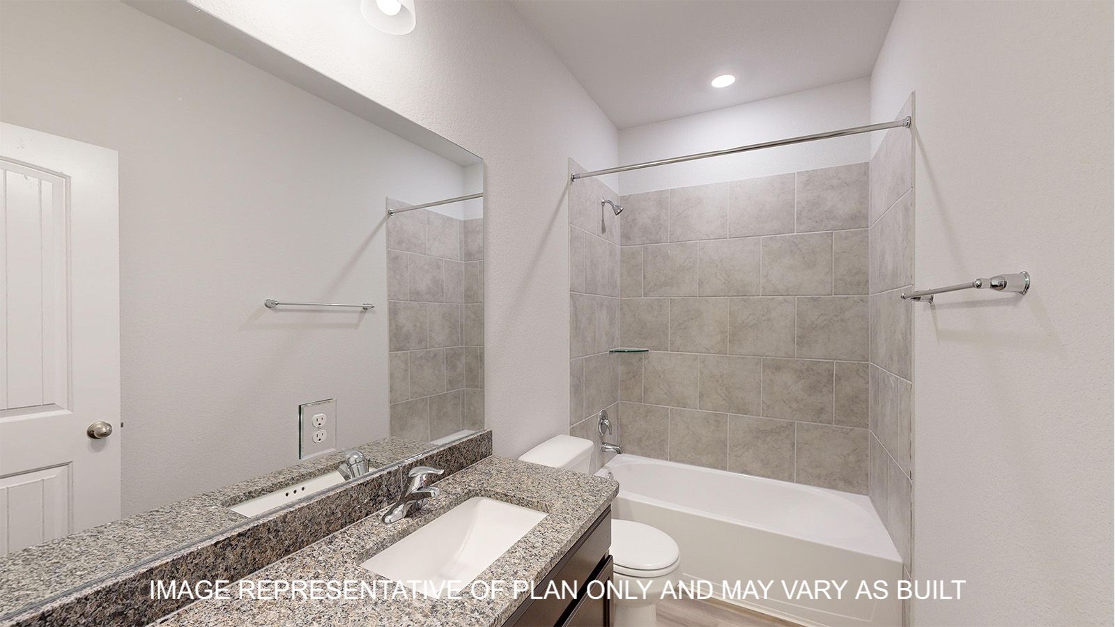 Magnolia secondary bathroom with dual vanities and granite countertops.