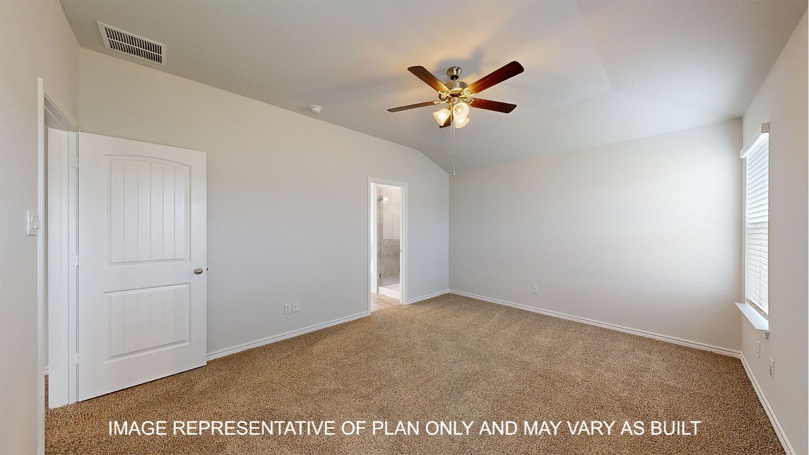 Magnolia primary bedroom with carpet flooring and ceiling fan.