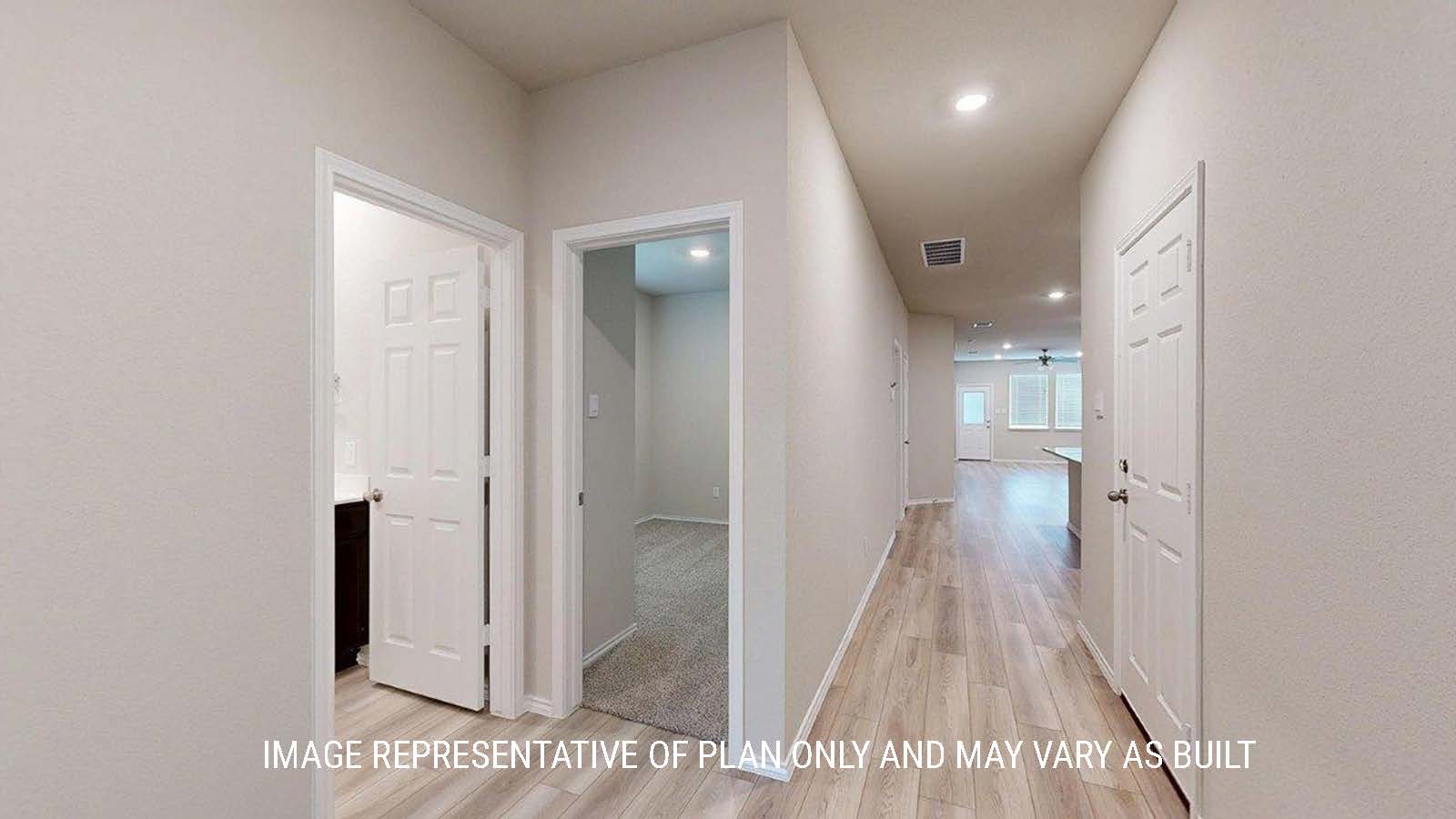1402 Entry way with view of secondary bedroom and secondary bathroom.