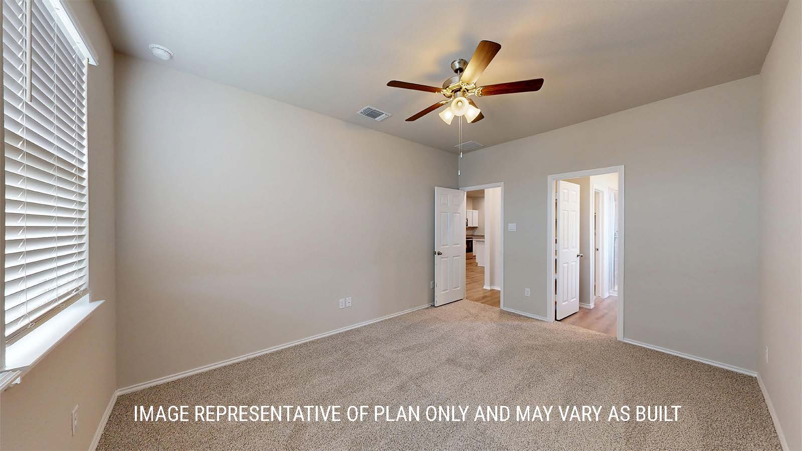 1530 Primary bedroom with carpet flooring and view of primary bathroom.