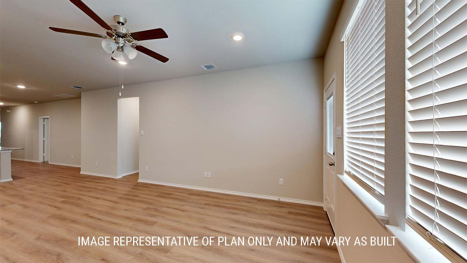 1530 Living room with vinyl flooring and view of kitchen.