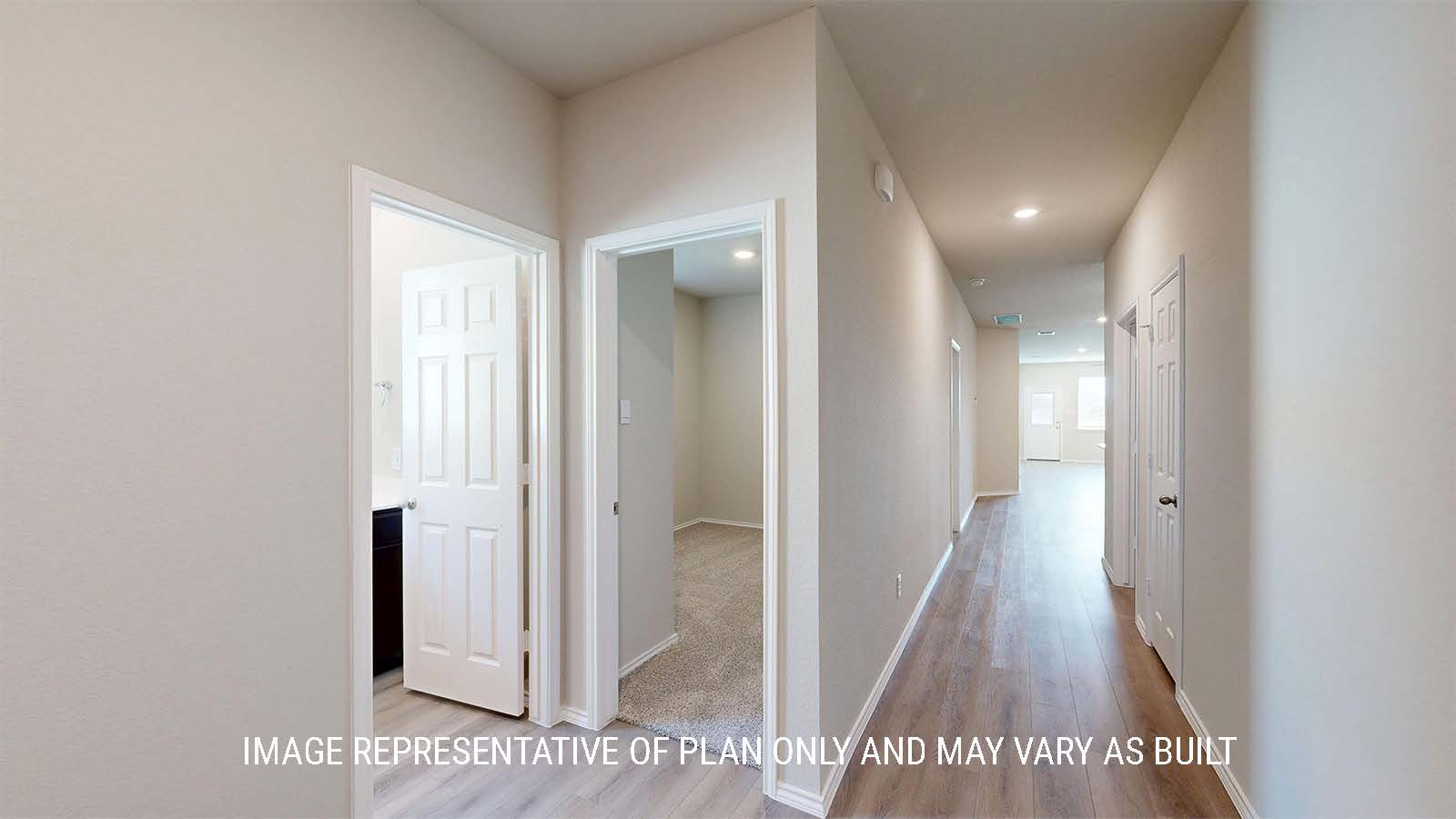 1530 Entry way with view of secondary bedroom and secondary bathroom.