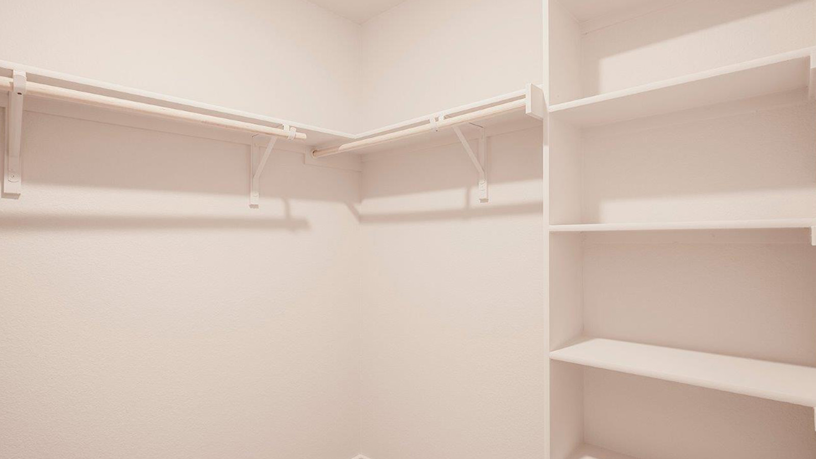 Schwertner Ranch kitchen with dark cabinets and granite countertops.