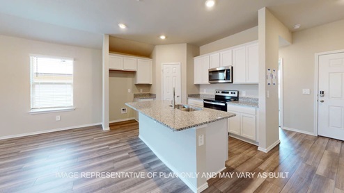 Elgin entry with view into kitchen.