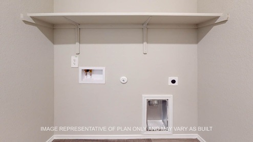 Elgin utility room with storage shelf.