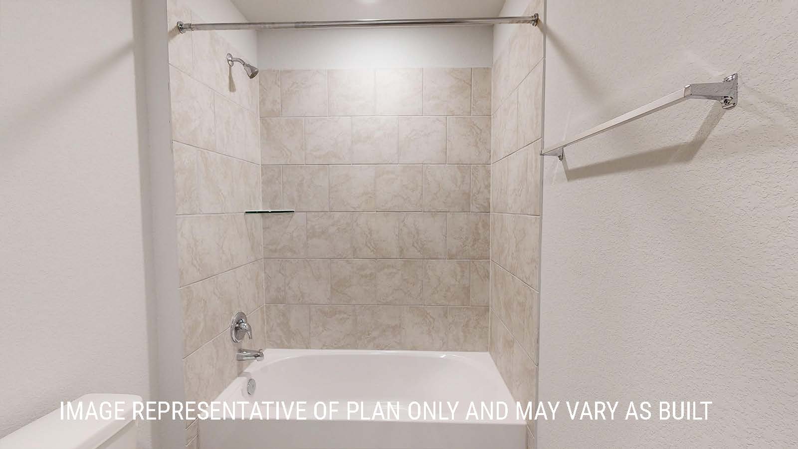 Seabrook secondary bathroom with shower and tub combo.