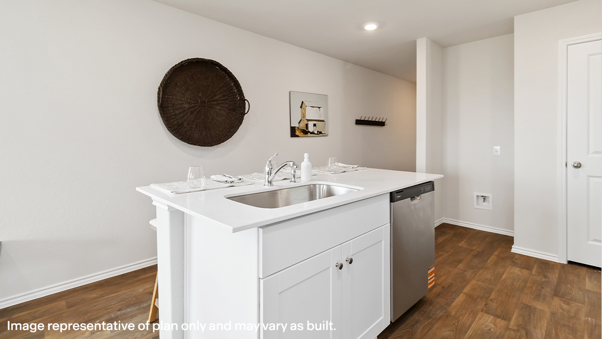 Atlanta kitchen with center kitchen island with granite countertops and white cabinet.
