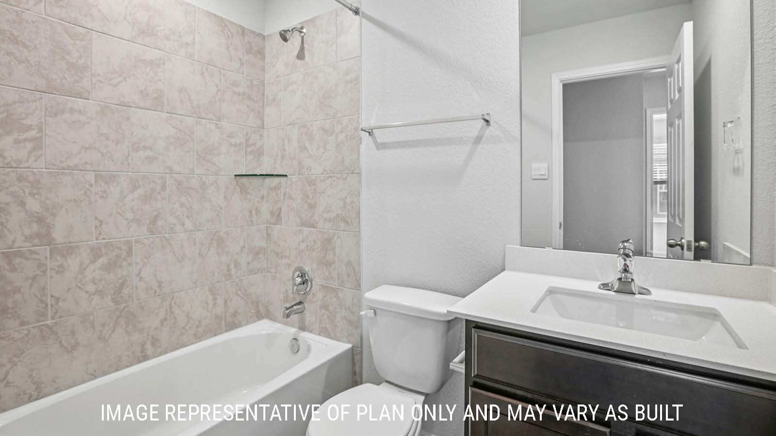 Atlanta secondary bathroom with vanity sink and shower and tub combo.