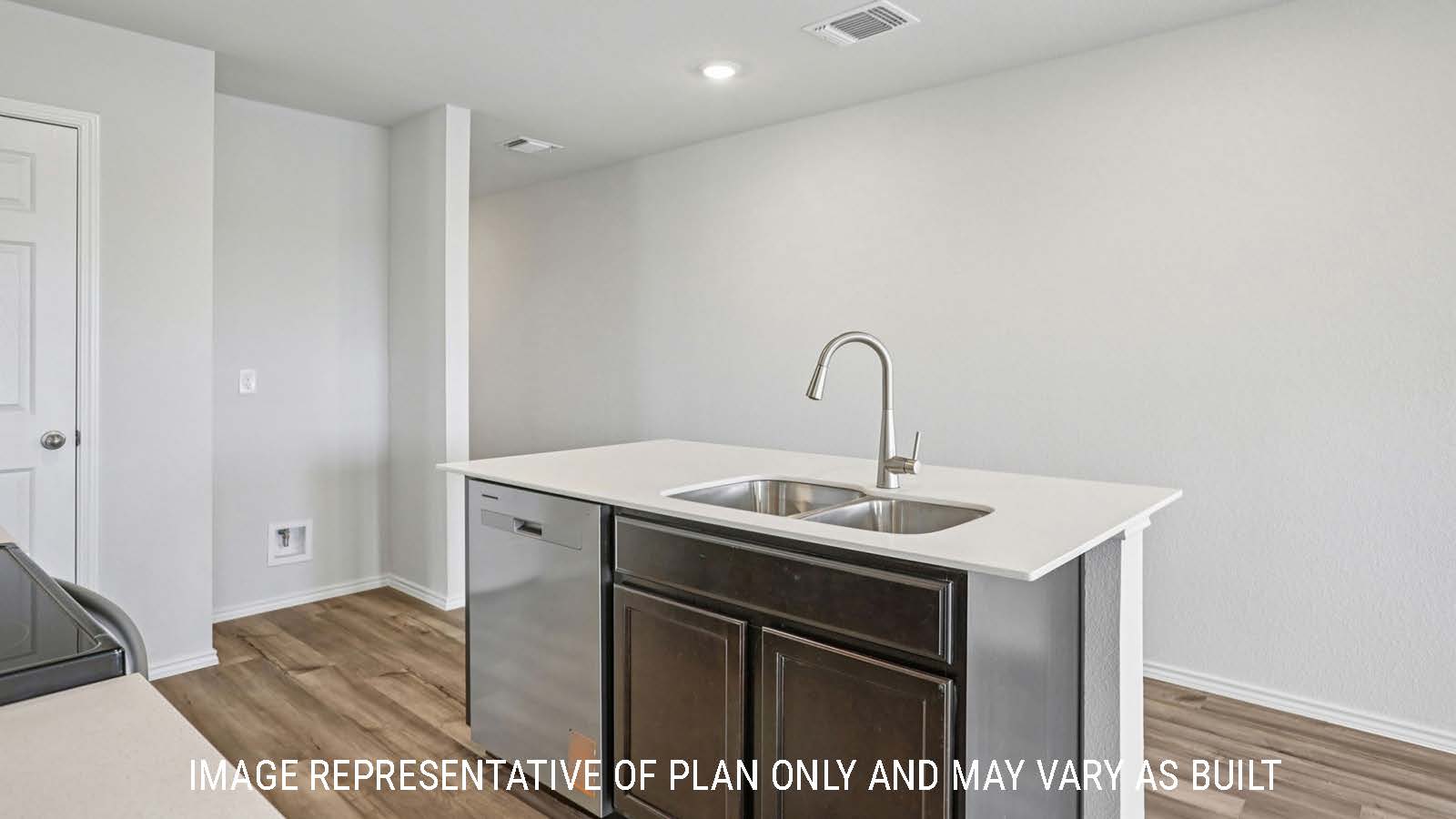 Atlanta kitchen with center kitchen island with granite countertops and view of front entry way.