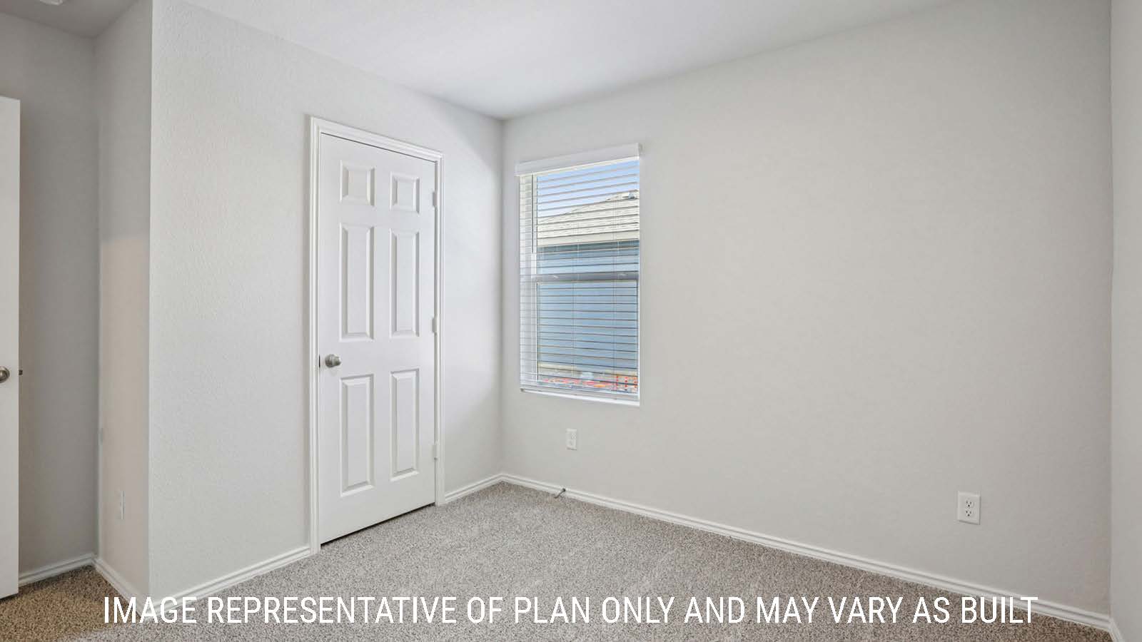 Caprock secondary bedroom with carpeted flooring and window for natural lighting.