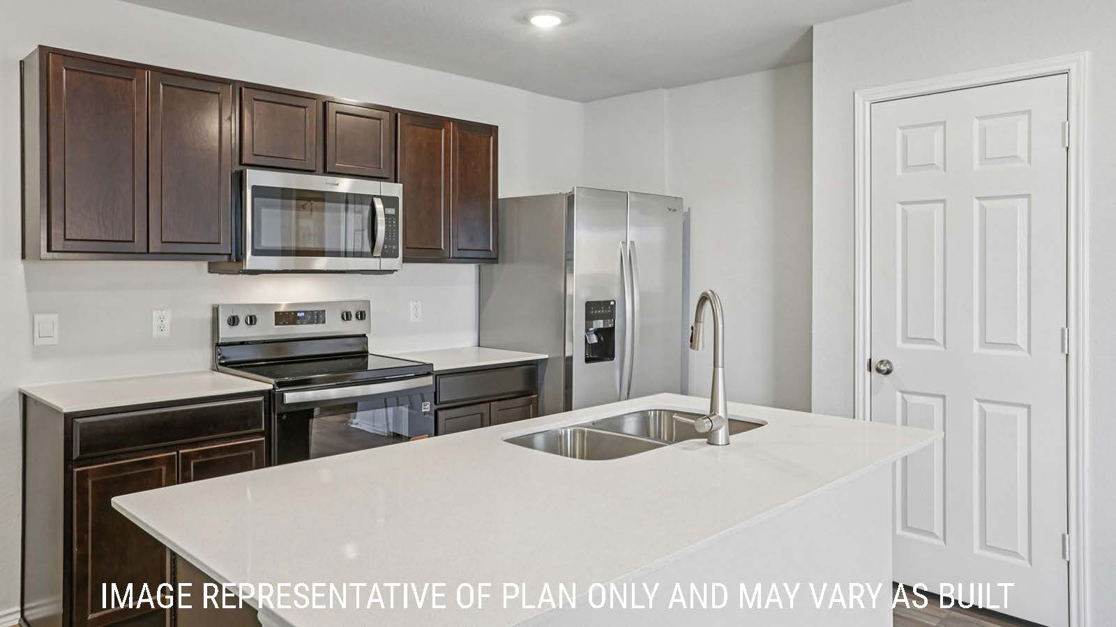 Caprock kitchen with granite countertops and dark cabinets.
