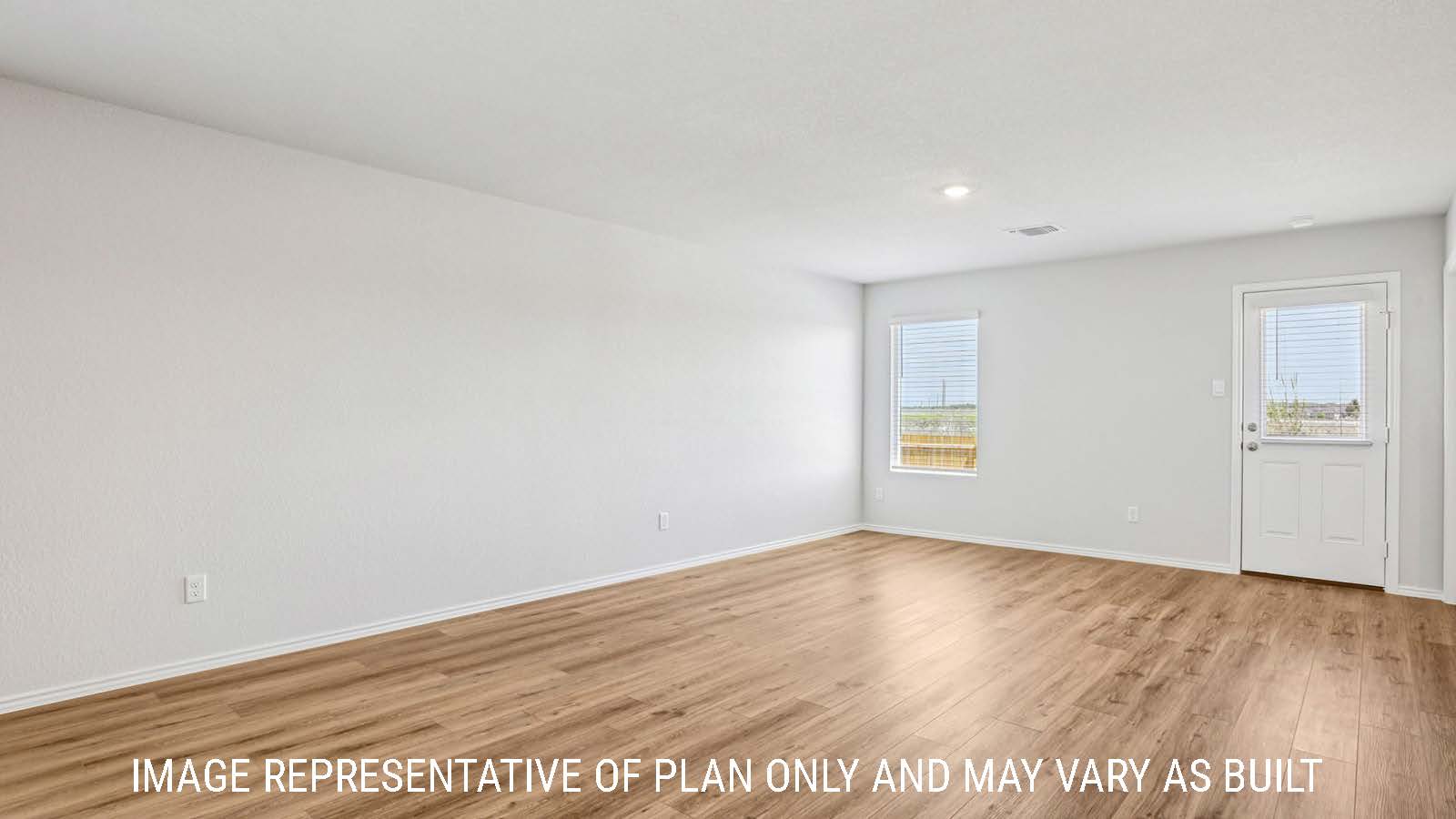 Estero living room with vinyl plank flooring and windows for natural lighting.