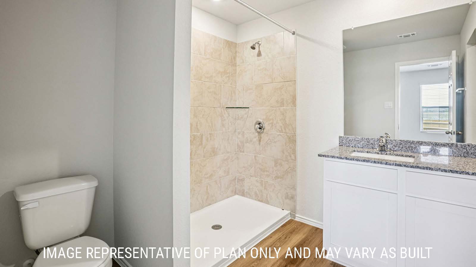 Estero primary bathroom with vanity sink and walk-in shower.
