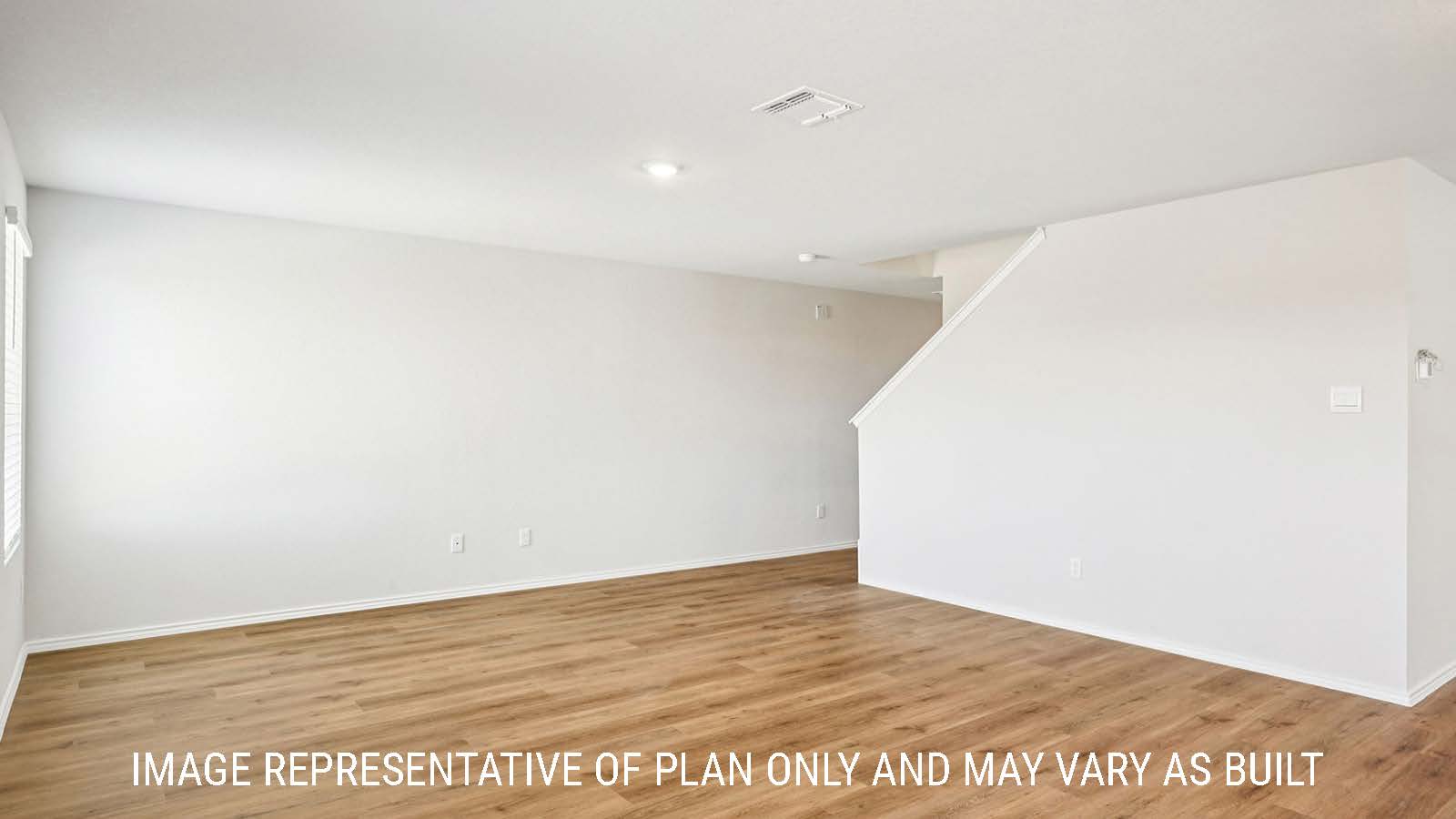 Franklin living room with vinyl plank flooring and view of entry way.