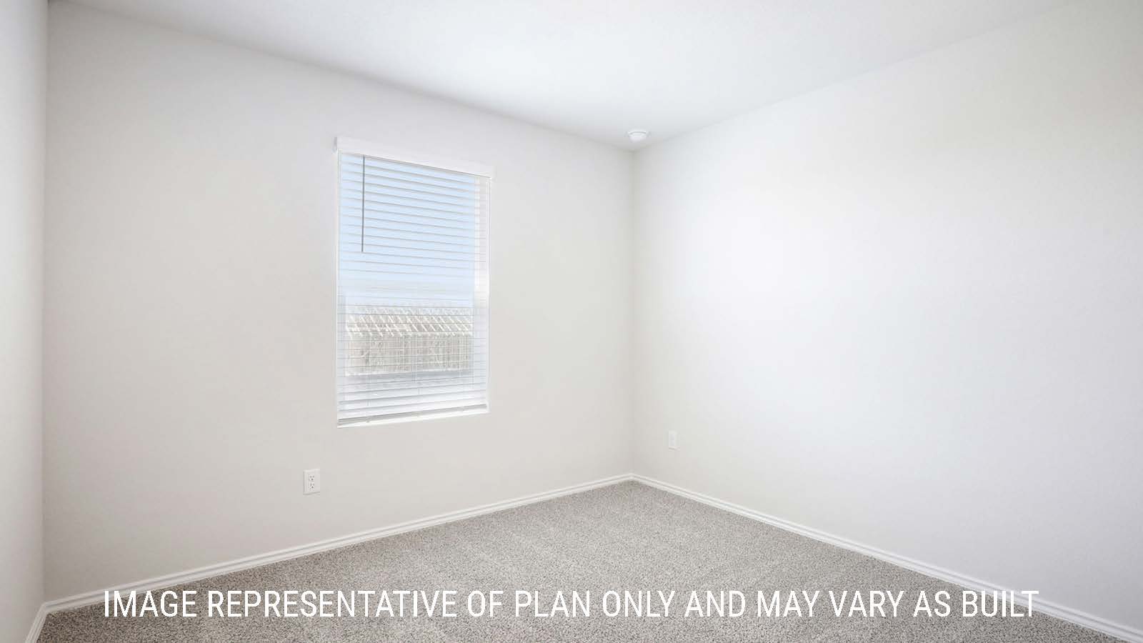 Franklin secondary bedroom with carpeted flooring and window for natural lighting.