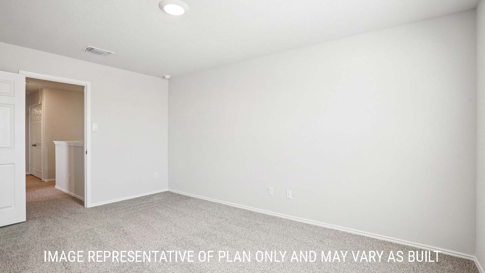 Franklin primary bedroom with carpeted flooring and view of hallway.