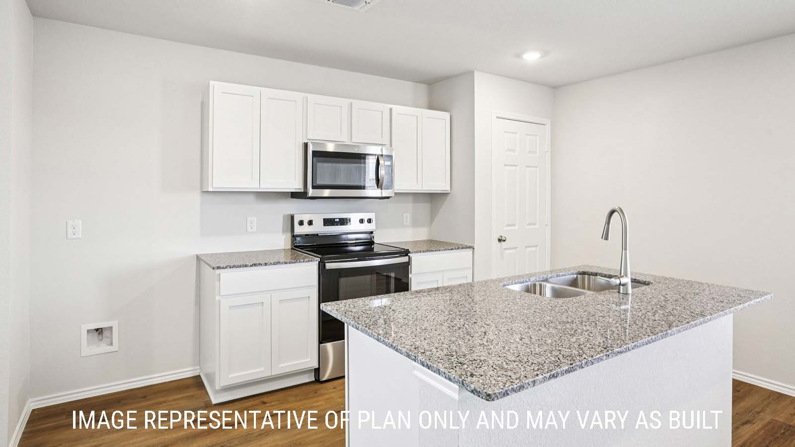 Franklin kitchen with kitchen island with granite countertops and light cabinets.