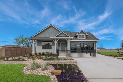 Willow Glenn model home exterior elevation with glass store front windows.