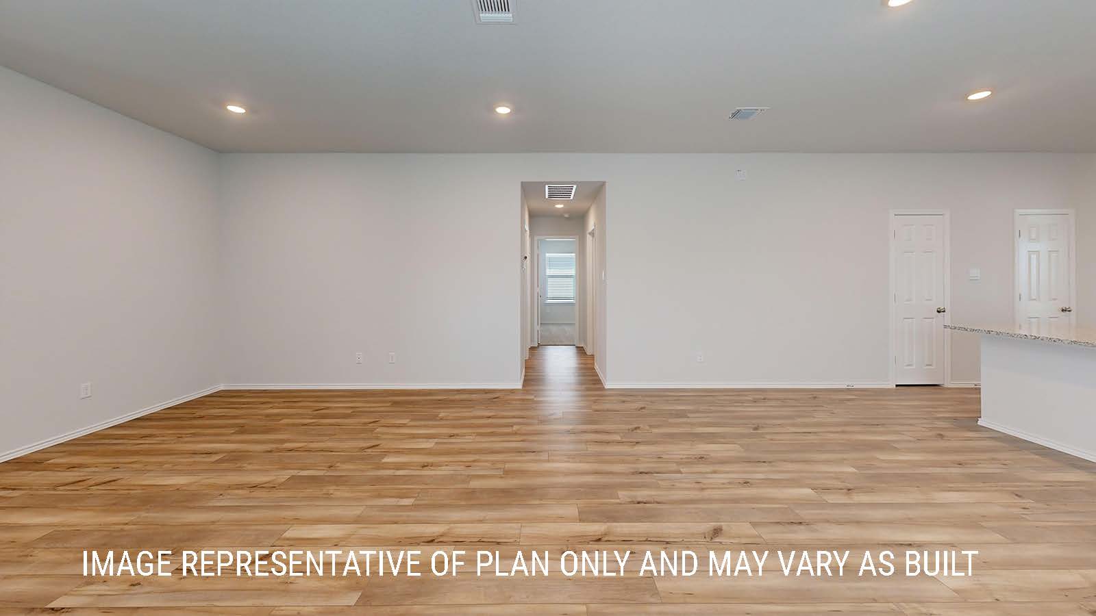 Seabrook dining room with view of open concept living room.