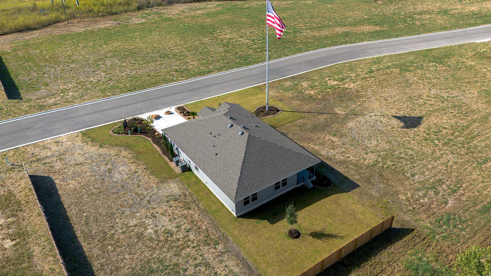 Pecan Creek Model Texas Cali Back Exterior ariel shot of home.
