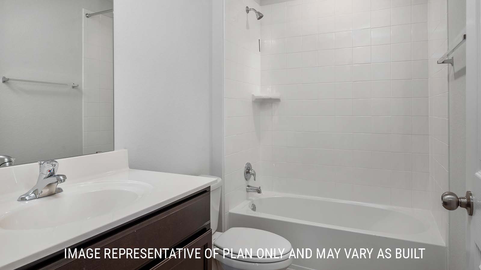 Ashburn secondary bathroom with single vanity and a shower and tub combo.