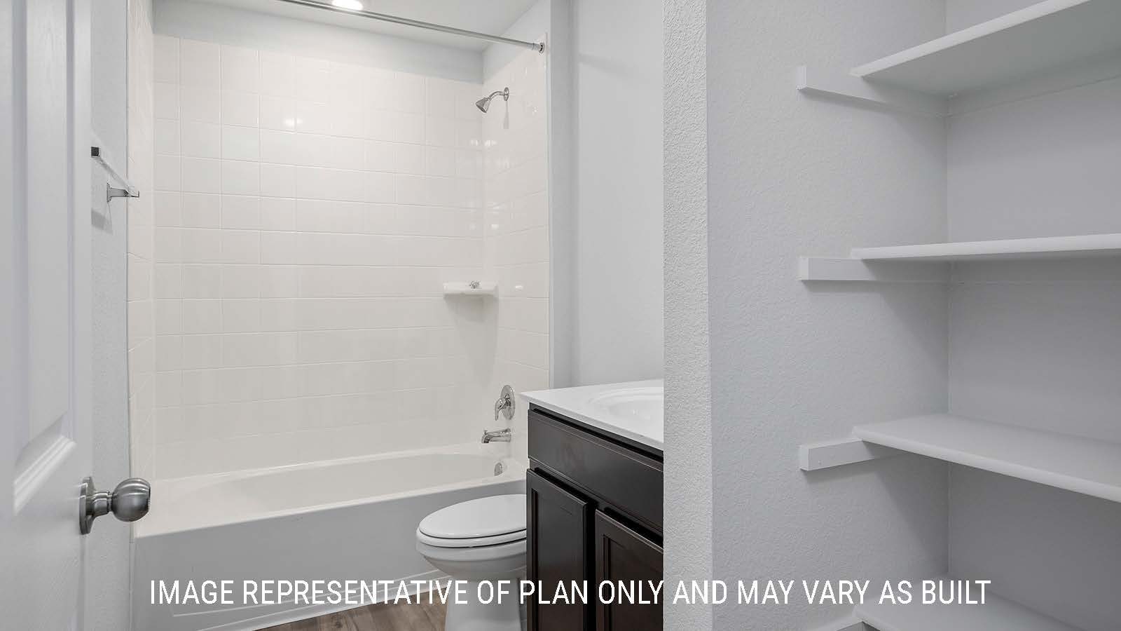 Bellvue secondary bathroom with single vanity and shower and tub combo.