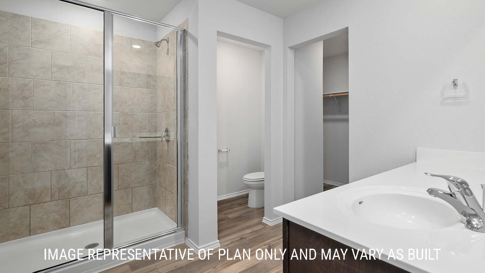 Bellvue primary bathroom with single vanity and walk-in shower.