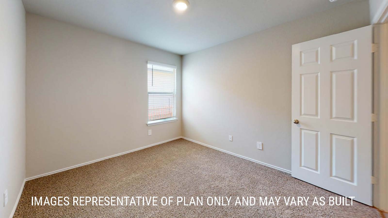 Elgin secondary bedroom with windows and carpeted flooring.