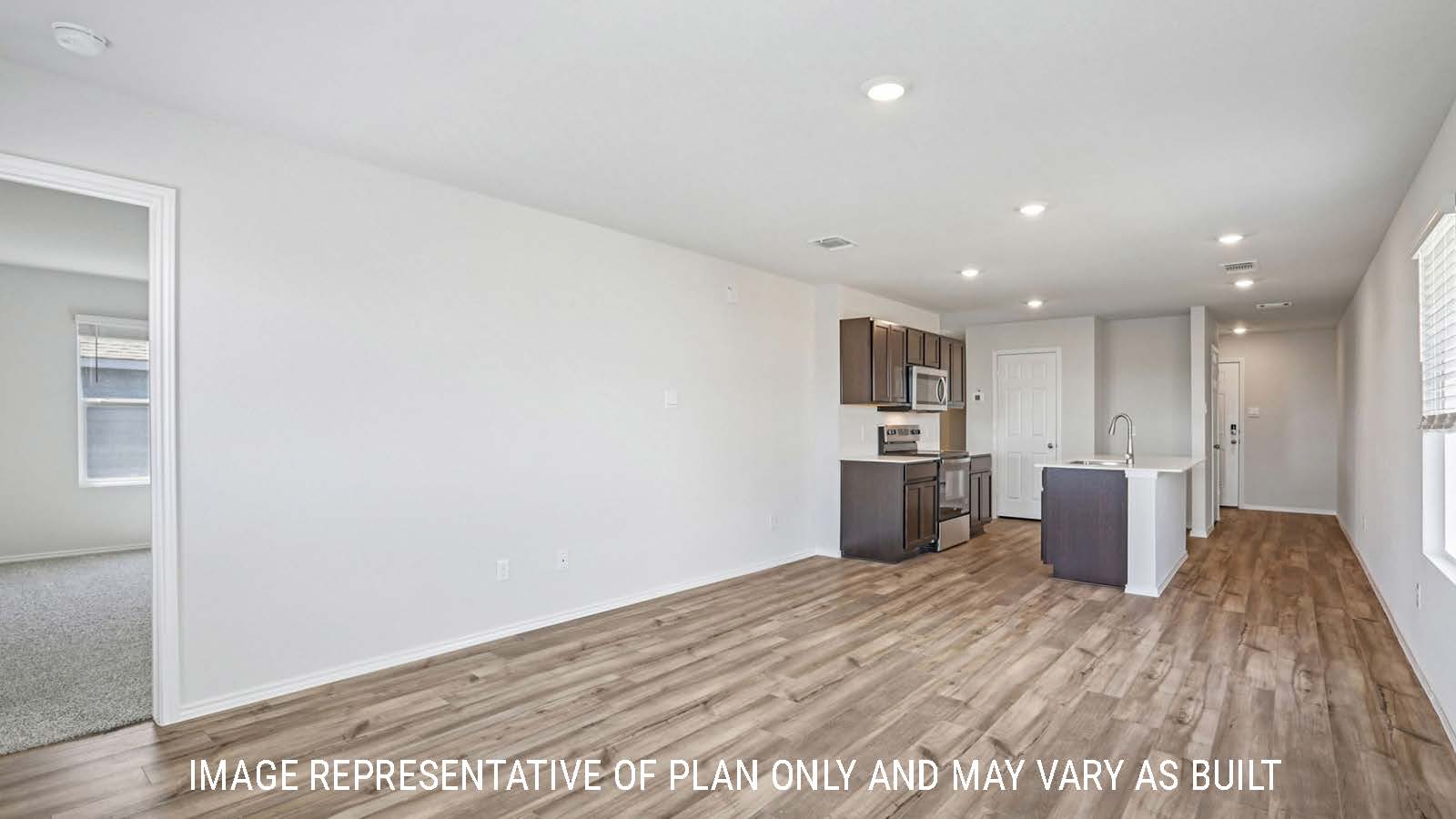 Atlanta living room with view of open concept dining room and kitchen and primary bedroom.