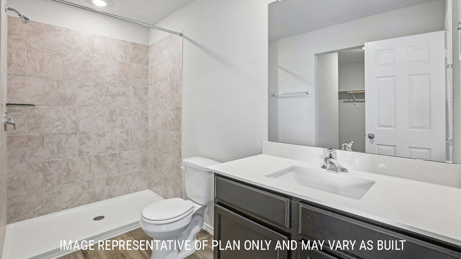 Atlanta primary bathroom with vanity sink and walk-in shower.