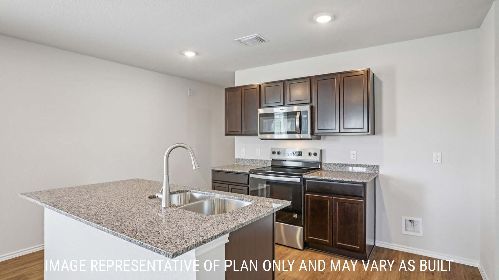 Barton kitchen with center kitchen island with granite countertops and dark cabinets.