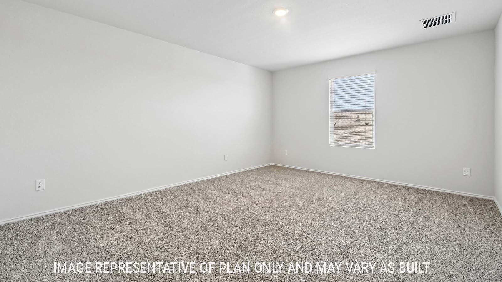 Davis primary bedroom with carpeted flooring and widnow for natural lighting.