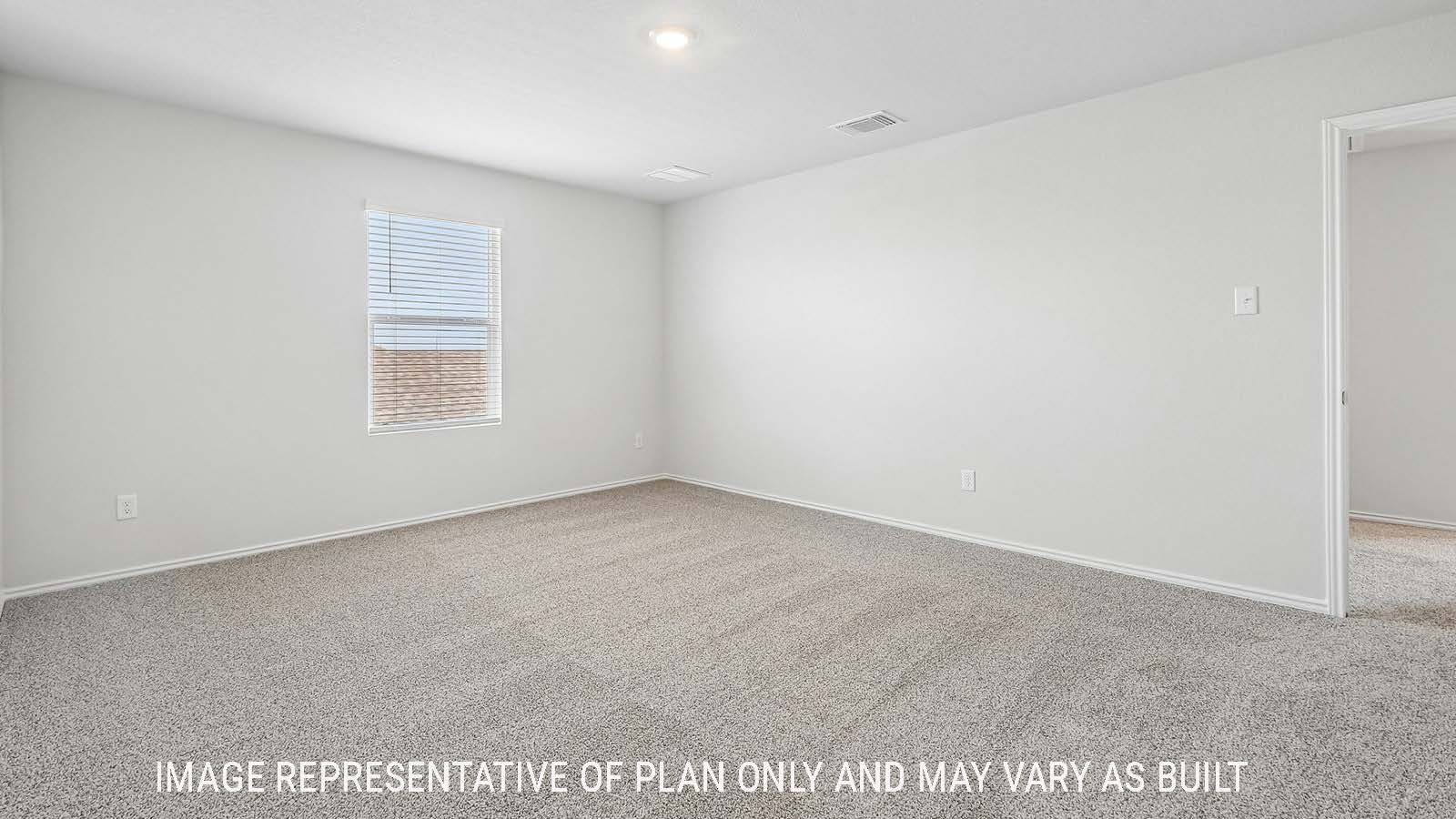 Davis primary bedroom with carpeted flooring and widnow for natural lighting.