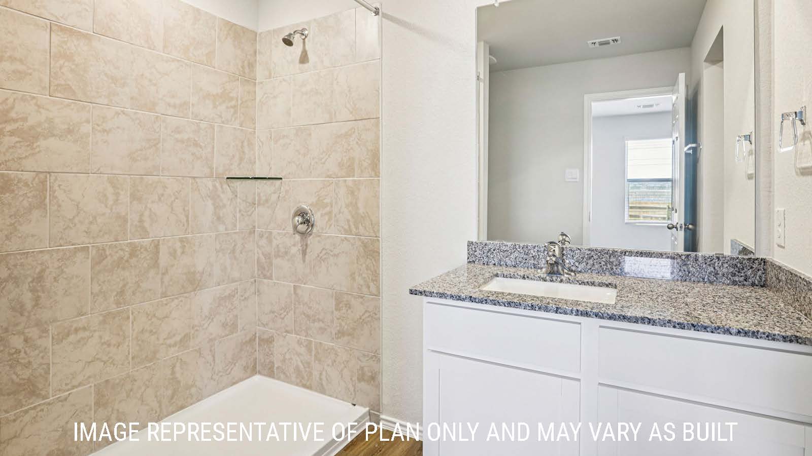 Estero primary bathroom with vanity sink and walk-in shower.