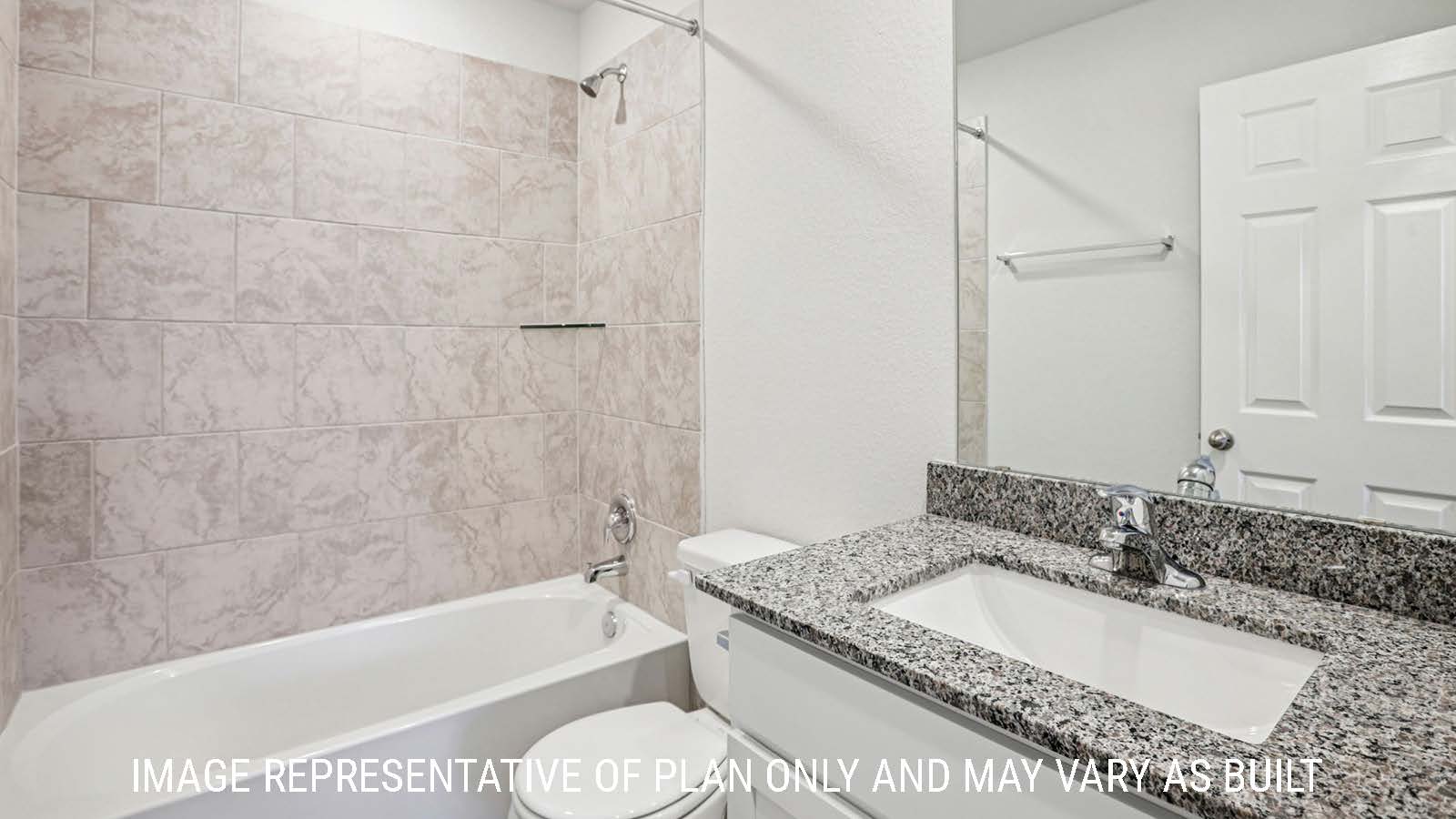 Estero secondary bathroom with vanity sink and shower and tub combo.