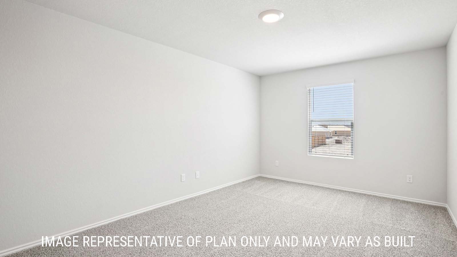 Franklin primary bedroom with carpeted flooring and window for natural lighting.