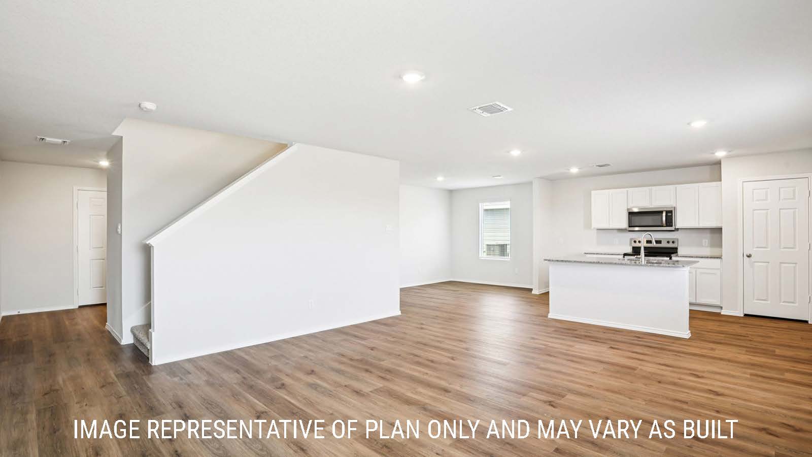 Franklin living room with vinyl plank flooring and view of entry way.