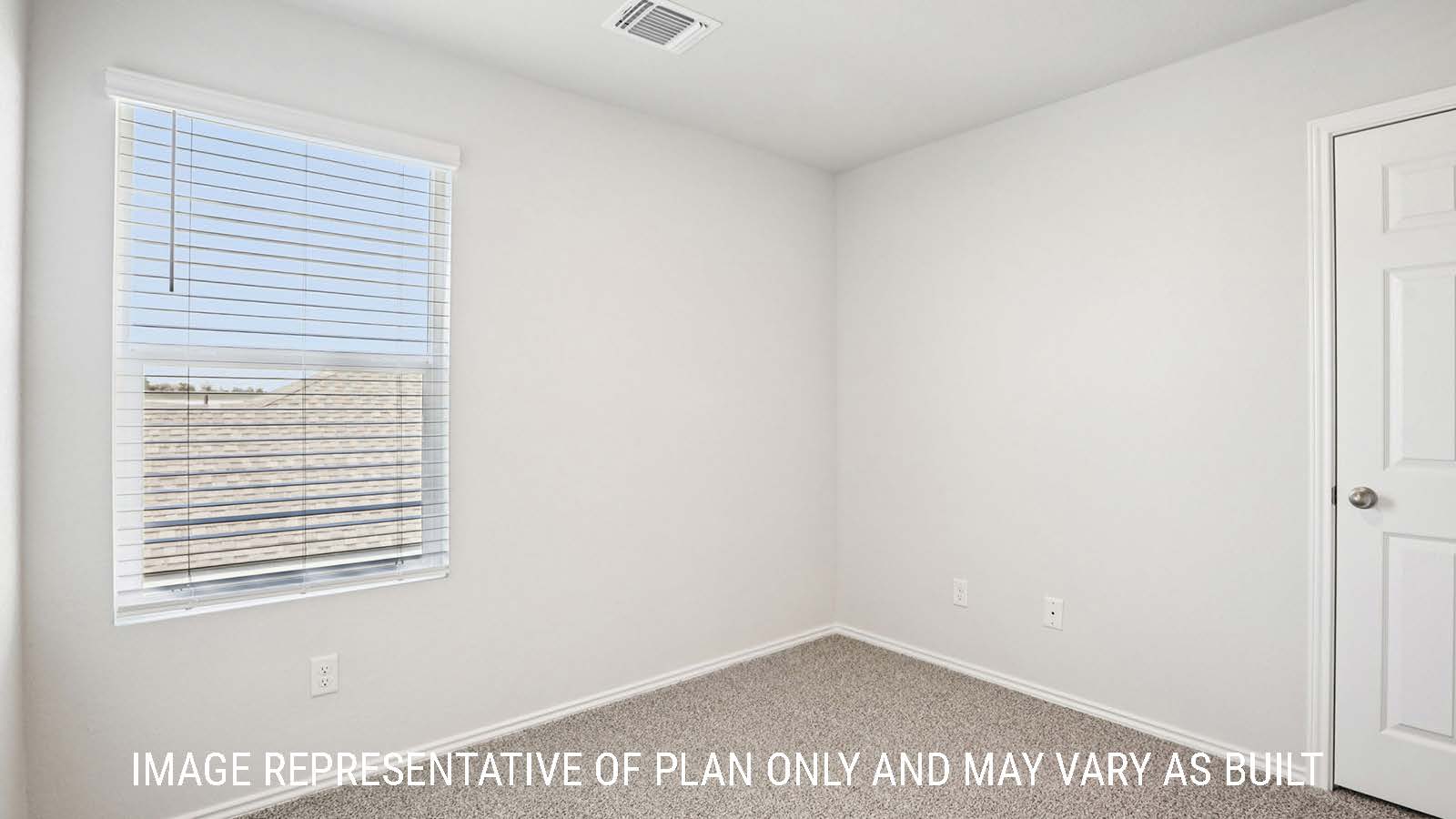 Franklin secondary bedroom with carpeted flooring and window for natural lighting.