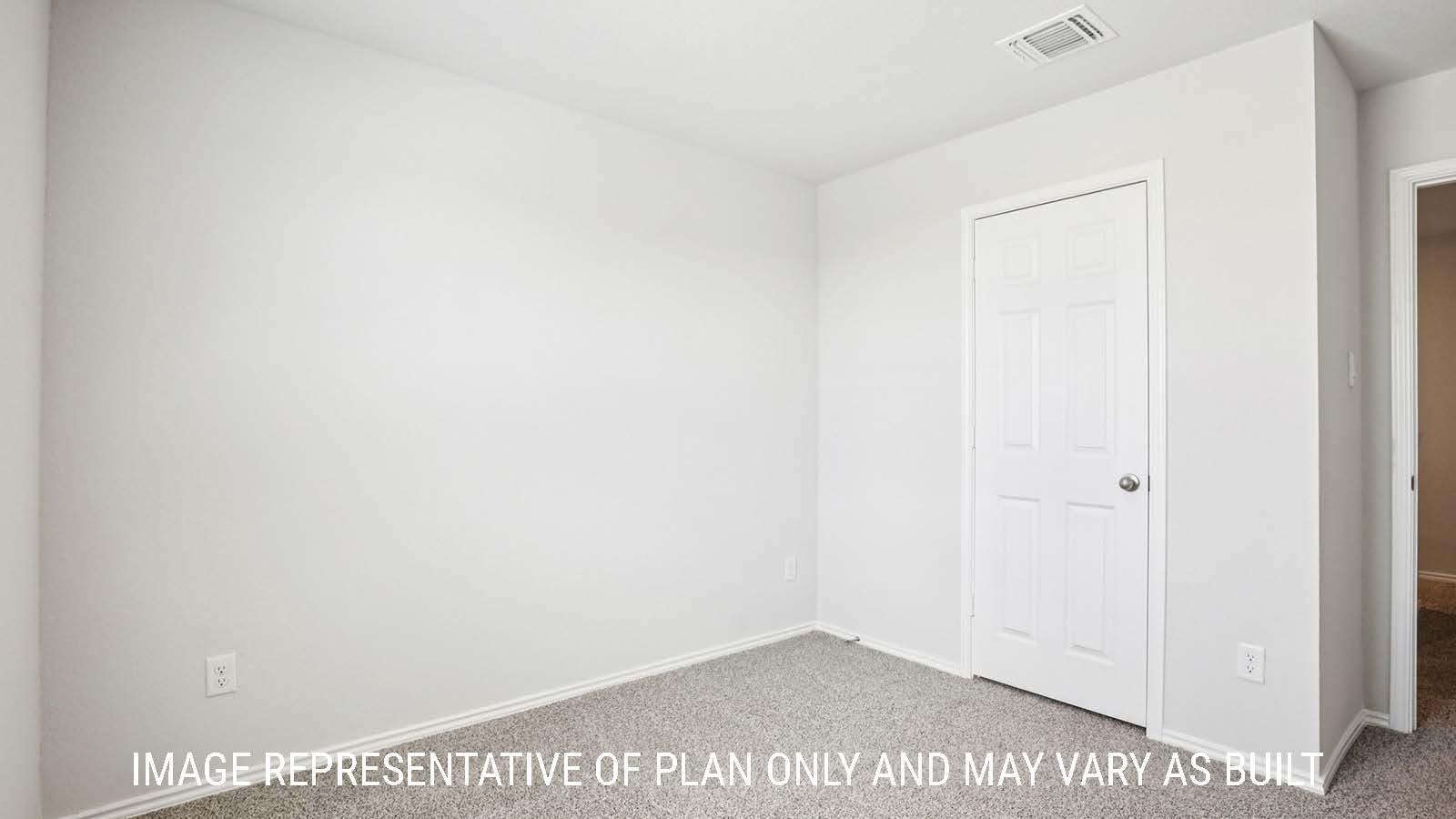 Franklin secondary bedroom with carpeted flooring and view of hallway.